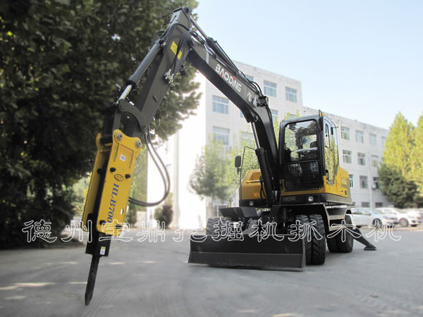 宝鼎多功能挖掘机抓木机.jpg 宝鼎多功能挖掘机抓木机.jpg