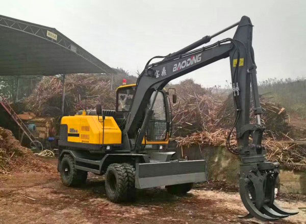 宝鼎轮胎挖掘机抓木机.jpg 宝鼎轮胎挖掘机抓木机.jpg