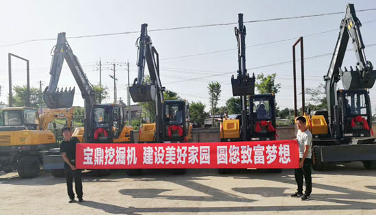 宝鼎轮式挖掘机致富新农村建设.jpg 宝鼎轮式挖掘机致富新农村建设.jpg